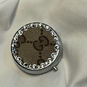 Repurposed Gucci bag made into a pill/earring case with crystal rhinestones.